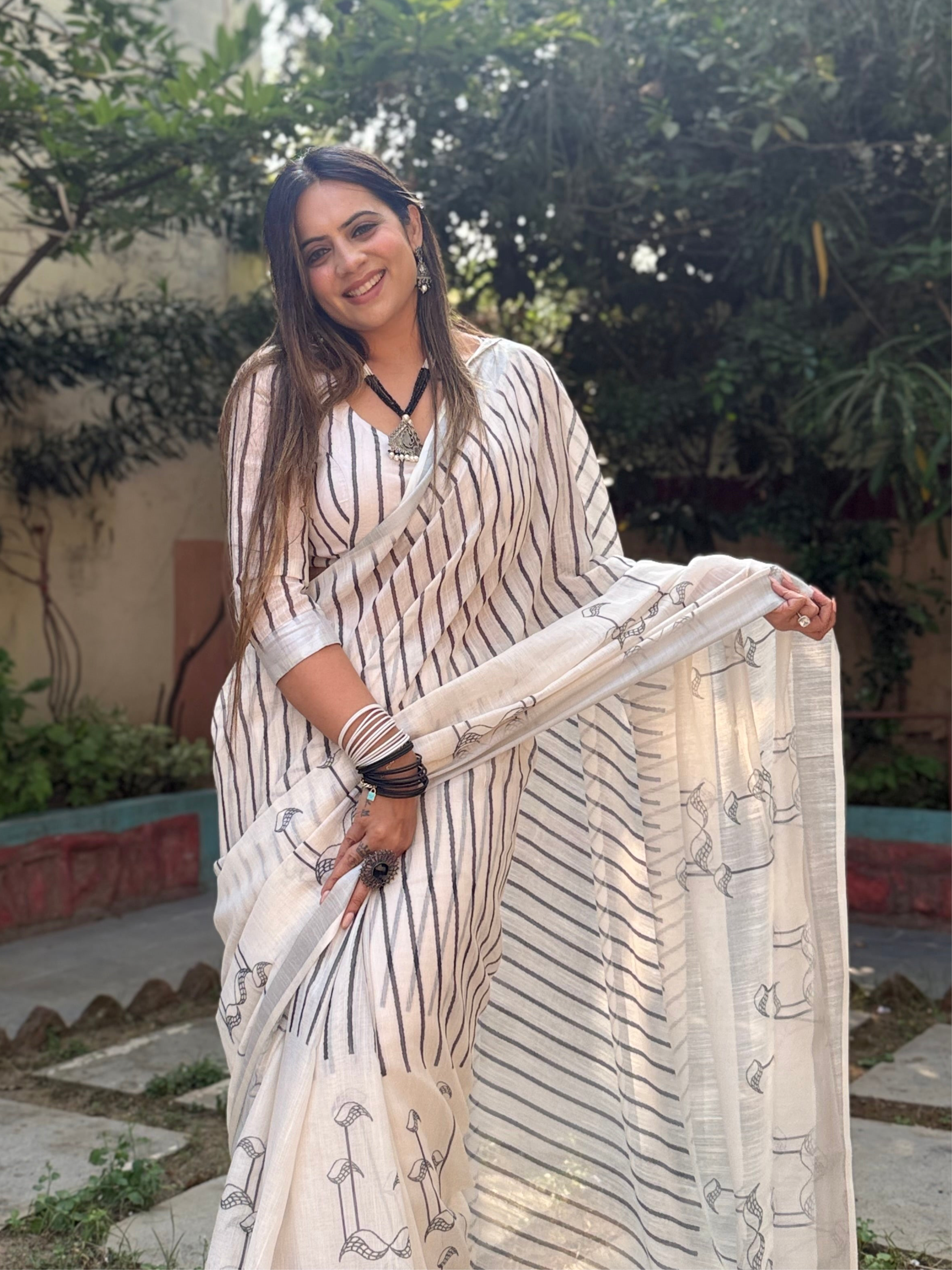 Elegant Off-White Pure Linen Digital Printed Saree with Striped Design and Unique Black Motif Pallu – Comes with Blouse Piece and Tassels