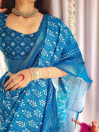 Elegant Blue Pure Linen Saree with Tassels and White Floral Patterns
