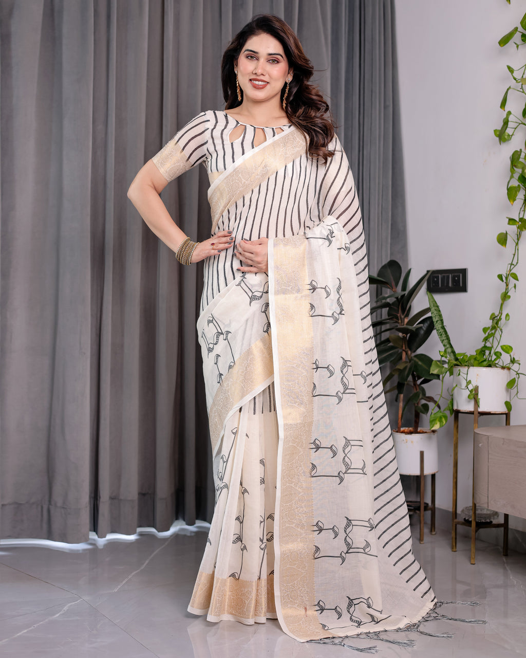 Off-White Handloom Linen Saree with Black Vertical Stripes & Tribal Motifs | Golden Zari Border & Tassel Pallu | Attached Blouse | 5.5m Saree + 0.8m Blouse