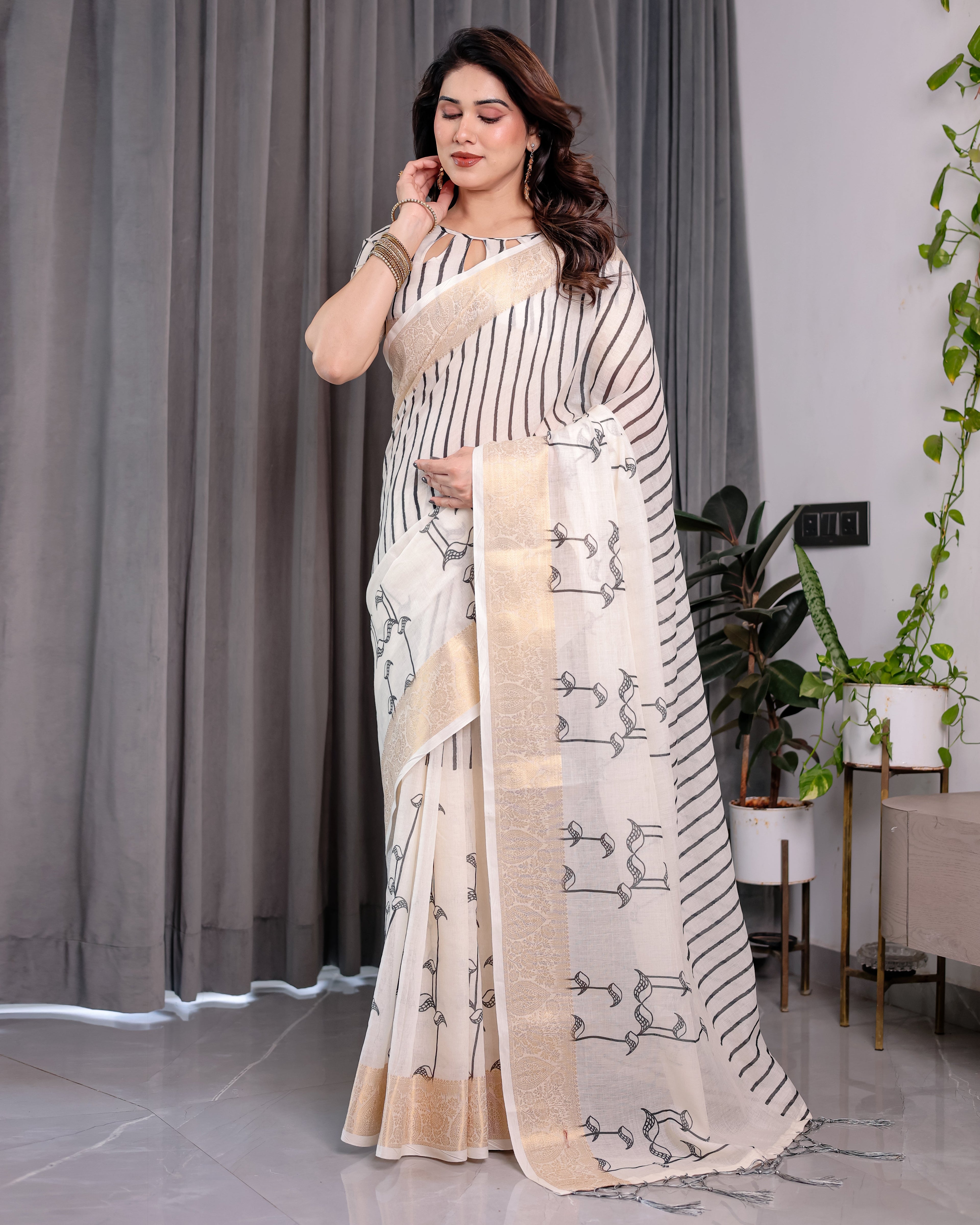 Off-White Handloom Linen Saree with Black Vertical Stripes & Tribal Motifs | Golden Zari Border & Tassel Pallu | Attached Blouse | 5.5m Saree + 0.8m Blouse