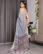 Pastel Grey Handloom Linen Saree with Multicolor Tribal Geometric Pallu & Zari Border | Tassels | 5.5m Saree + 0.8m Blouse