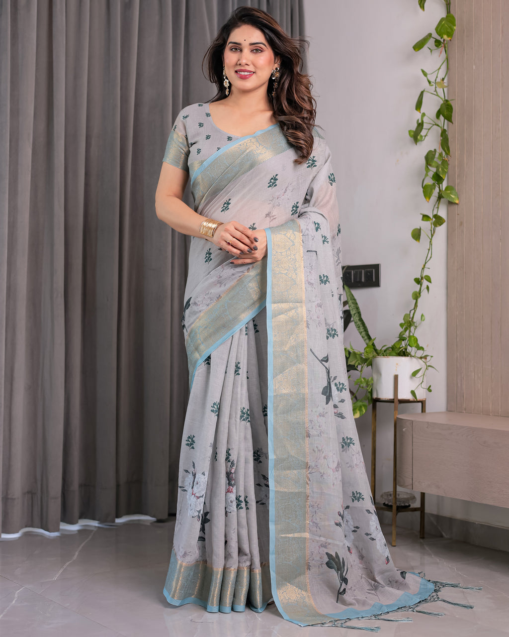 Elegant Ice Grey Handloom Linen Saree with Floral Print, Gold Zari Border & Tassel Detailing | Attached Blouse Piece | 5.5m Saree + 0.8m Blouse