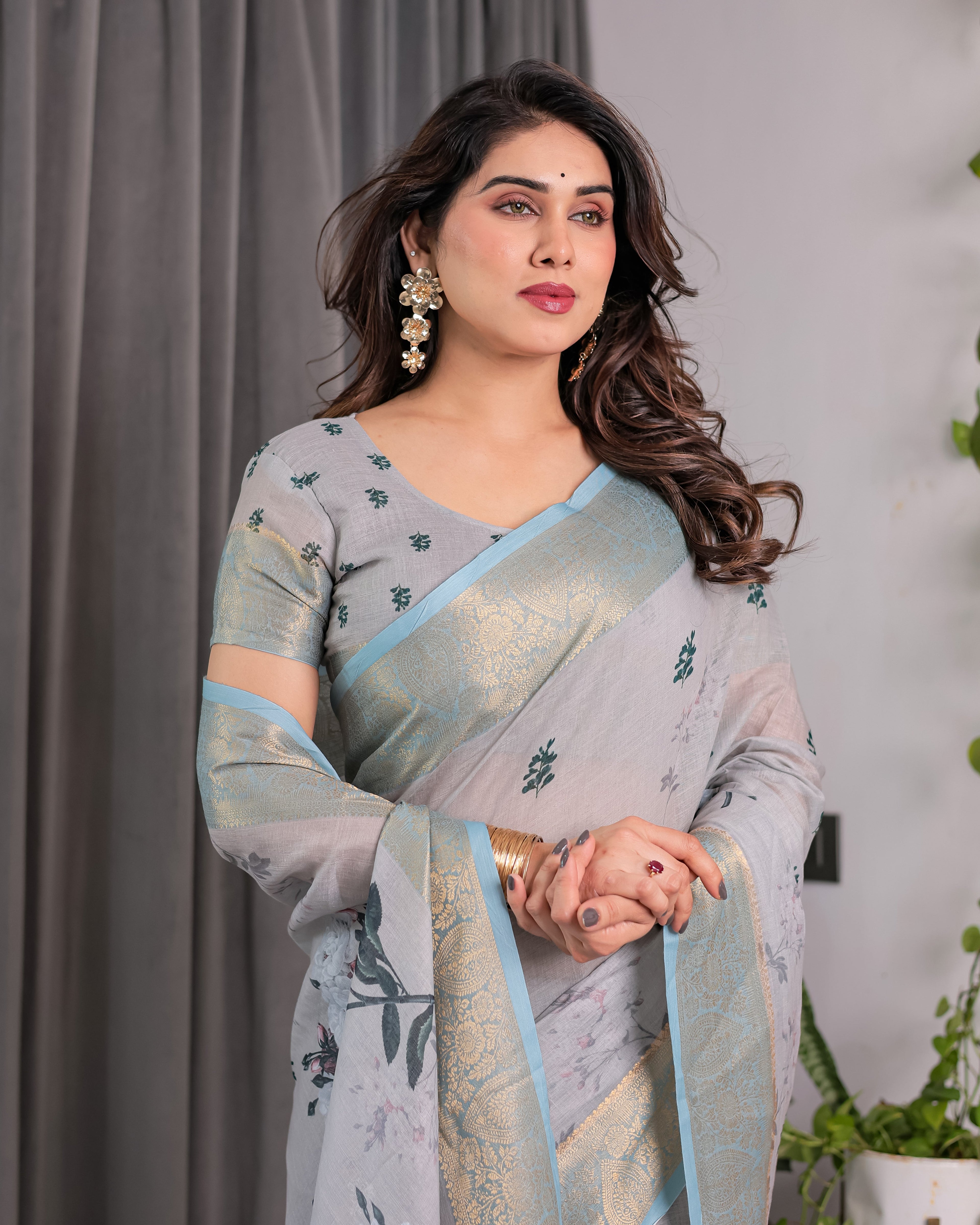 Elegant Ice Grey Handloom Linen Saree with Floral Print, Gold Zari Border & Tassel Detailing | Attached Blouse Piece | 5.5m Saree + 0.8m Blouse