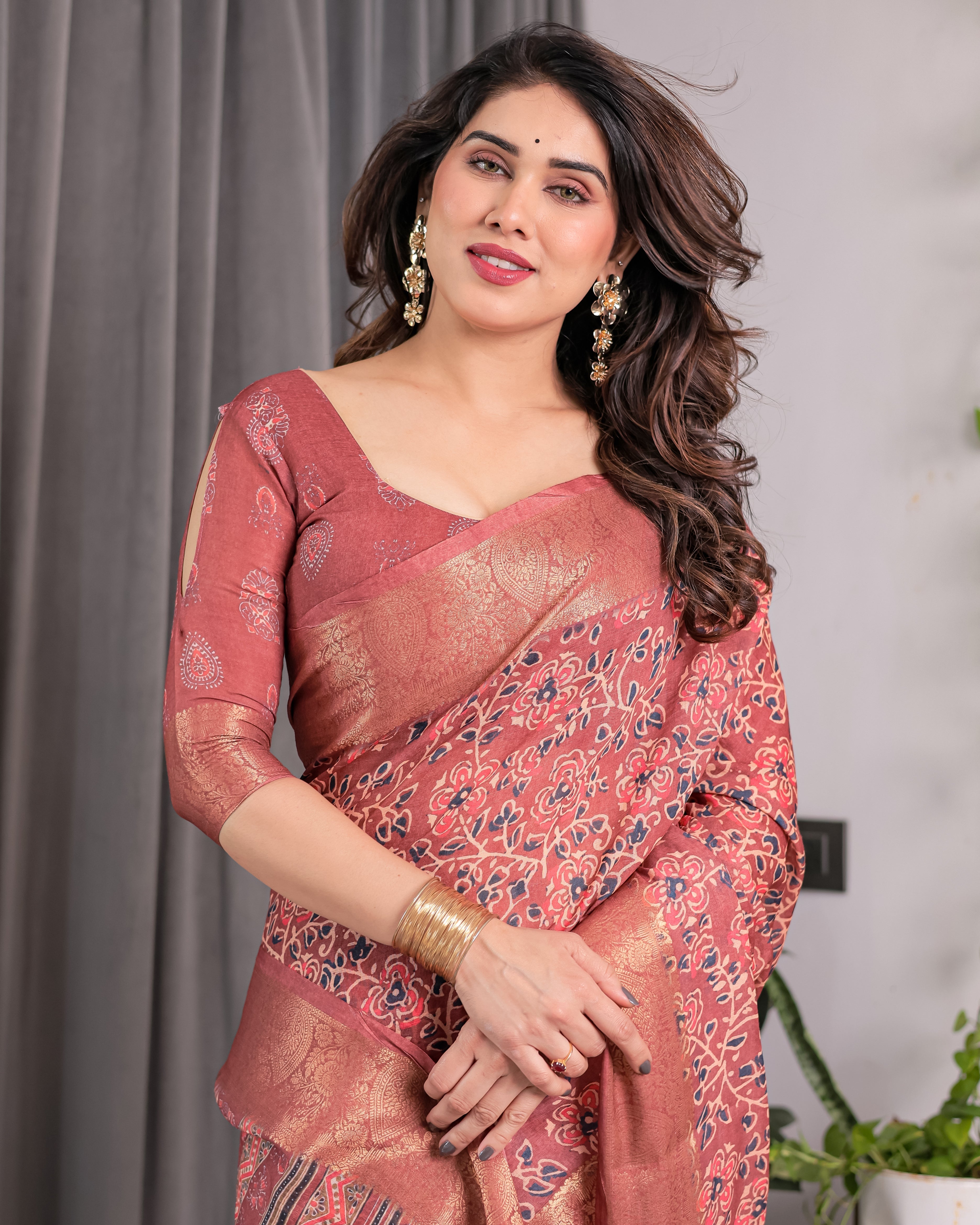 Rust Maroon Handloom Linen Saree with All-Over Floral Print & Ornate Traditional Pallu | Gold Zari Border & Tassel Finish | Attached Blouse | 5.5m Saree + 0.8m Blouse