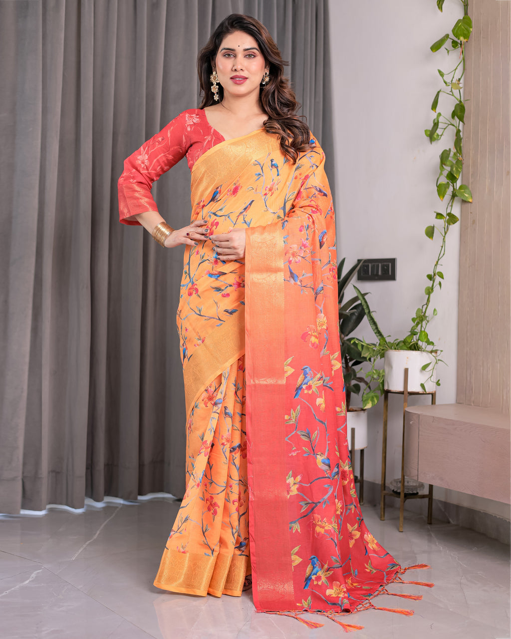 Sunset Orange Handloom Linen Saree with Bluebird & Floral Digital Print | Contrasting Red Pallu & Gold Zari Border | Tassel Detailing | Attached Blouse | 5.5m Saree + 0.8m Blouse