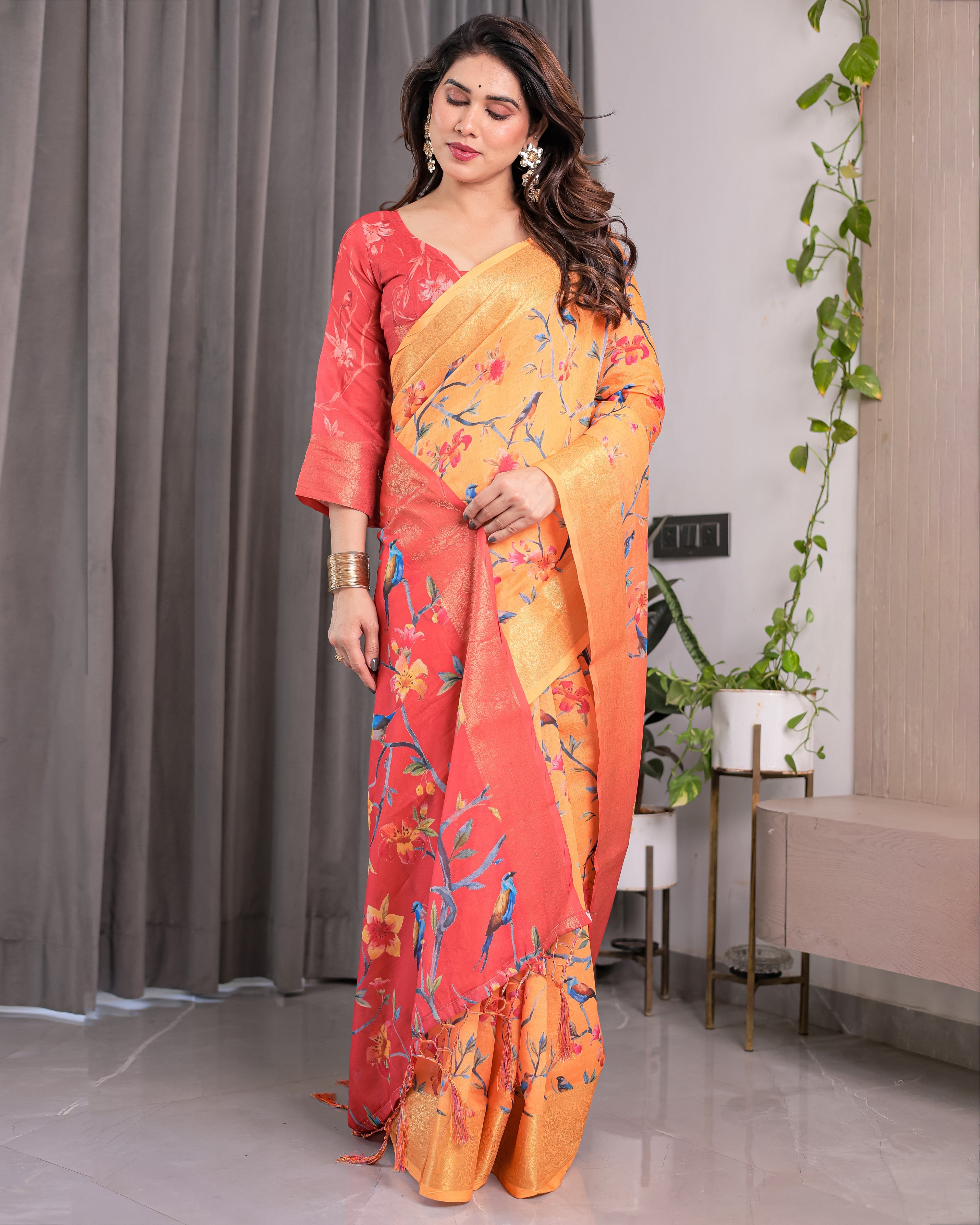 Sunset Orange Handloom Linen Saree with Bluebird & Floral Digital Print | Contrasting Red Pallu & Gold Zari Border | Tassel Detailing | Attached Blouse | 5.5m Saree + 0.8m Blouse
