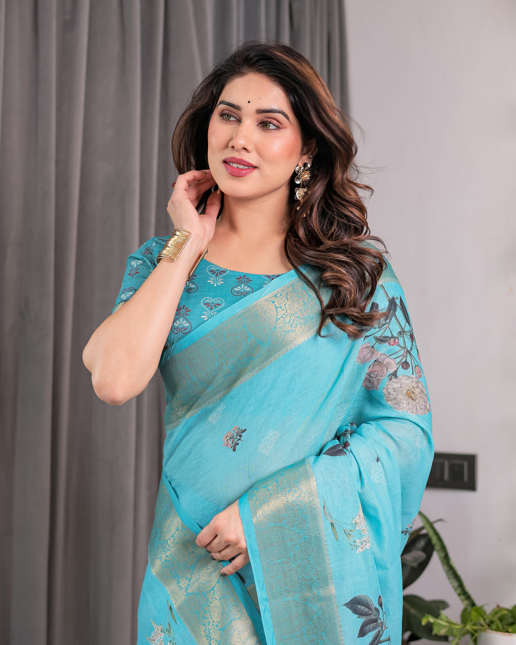 Turquoise Blue Handloom Linen Saree with Floral Digital Print & Golden Zari Border | Tassel Detailing | Attached Blouse | 5.5m Saree + 0.8m Blouse